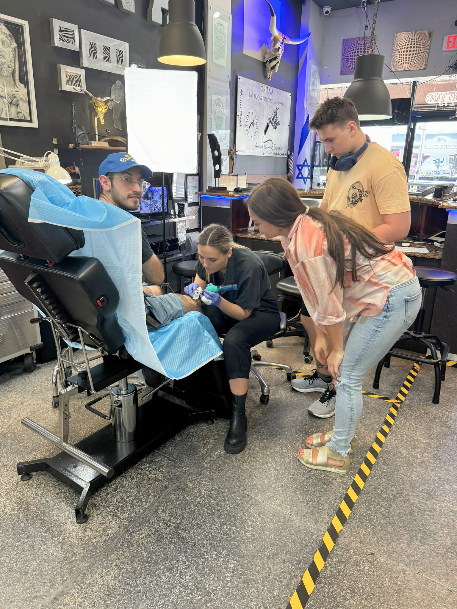 Student practicing tattooing at Oriana
